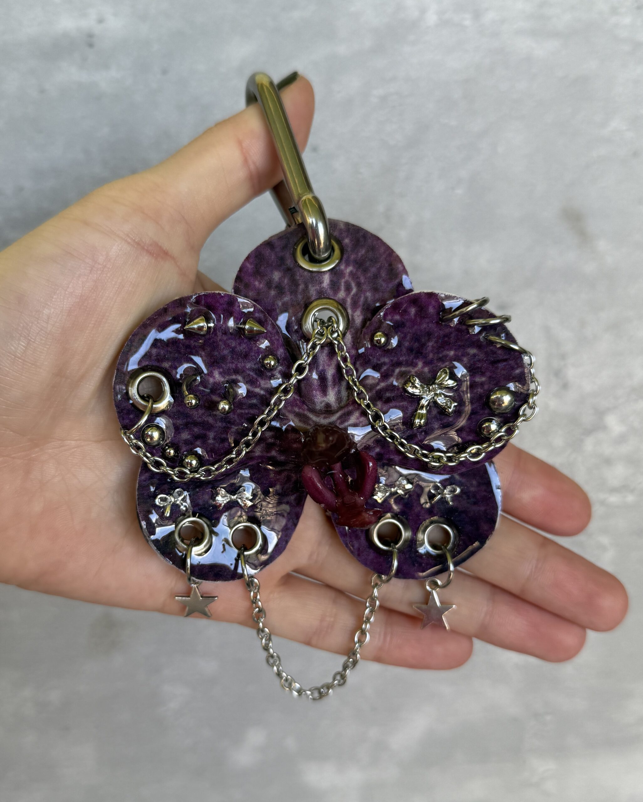 Dark Coquette Bag Charm • Deep Plum Purple and Bright Silver • Resin Orchid with Spiked Bows, Stars and Pierced Petals Trinket - Image 4