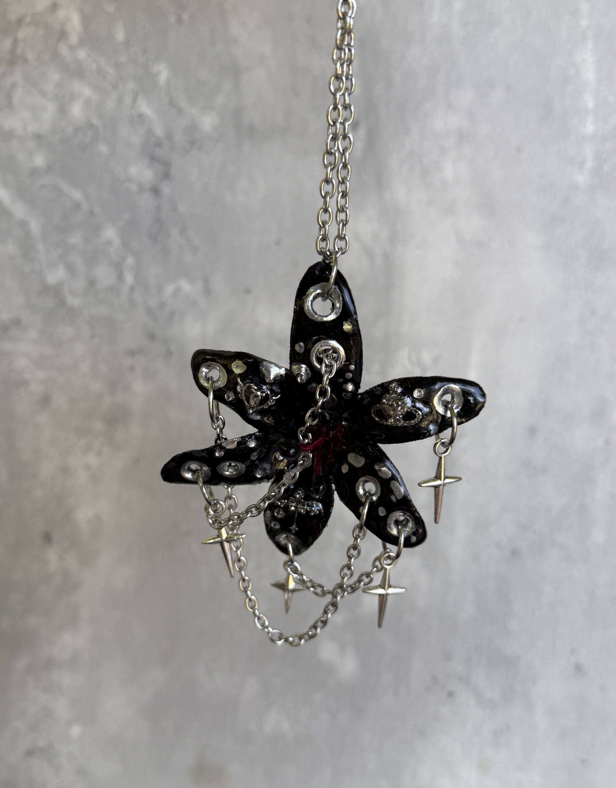 Resin Orchid Necklace Pendant • Black and Silver • Stars and Crosses Trinket - Image 3